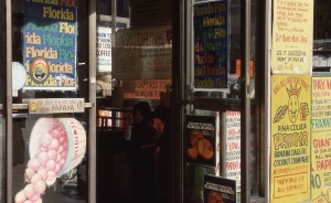 Papaya King, E. 86th St. and 3rd Ave., NYC, January 1989 signs on door                   